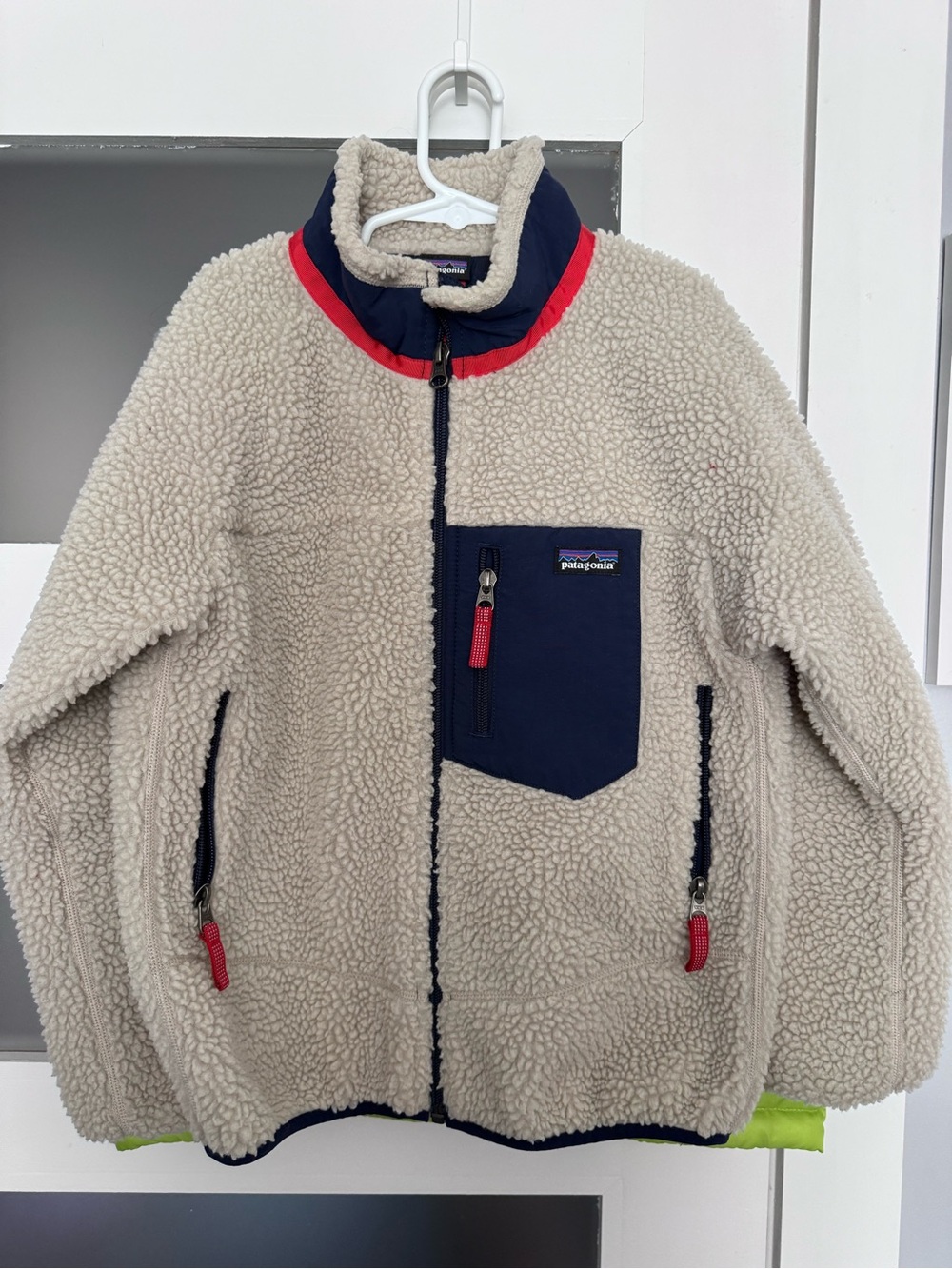 Patagonia Kids Cream Sherpa Jacket with Navy Chest Pocket & Red Trim